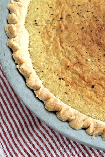 Brown Butter Buttermilk Pie - A classic buttermilk pie with the flavor of browned butter added in. Get this delicious dessert recipe from CookingWithBooks.com