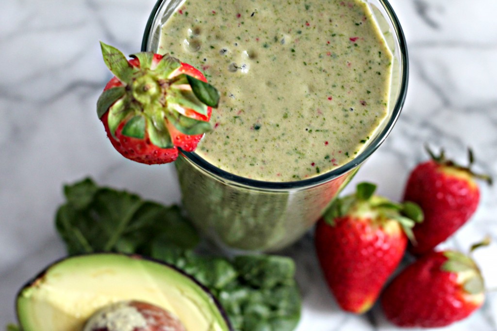Packed with fresh avocado, spinach, and strawberries - this is a deliciously healthy green smoothie to start your morning with!