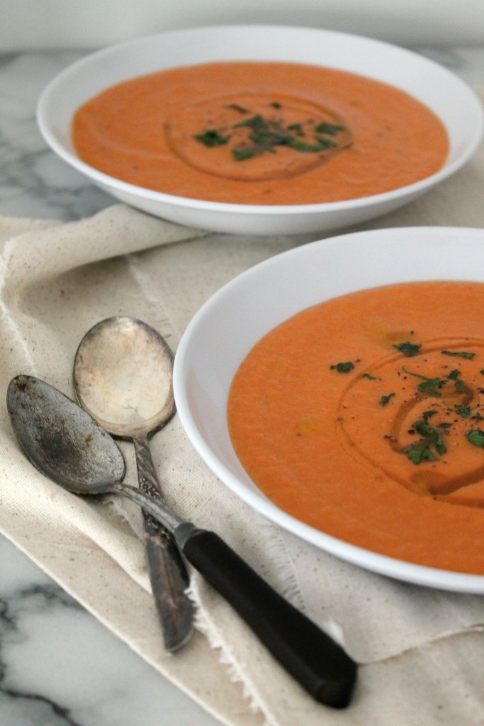 This ginger carrot soup is the ideal recipe to warm you up from the inside out! It's comfort food in a bowl! Vegan, gluten free, and healthy. Get the recipe from Cooking with Books